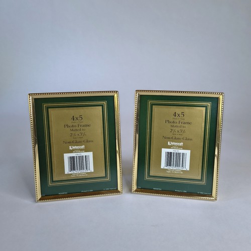 Pair lacquered brass clad - of,